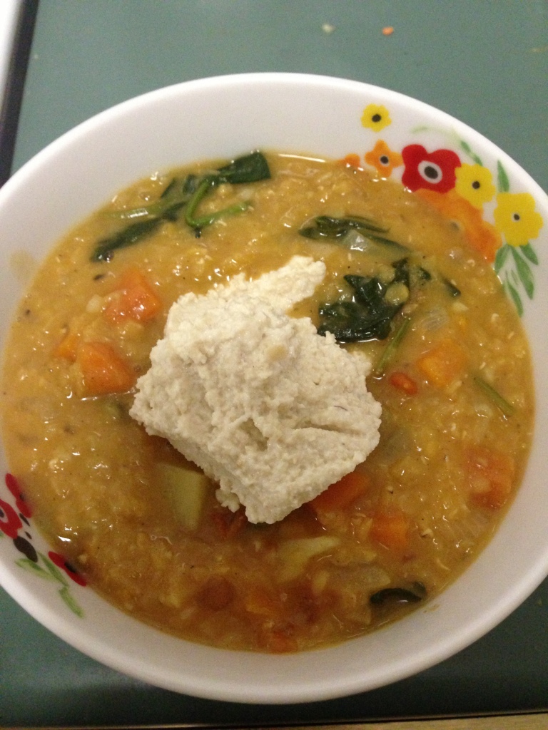 Curried red lentil soup with cashew sour cream